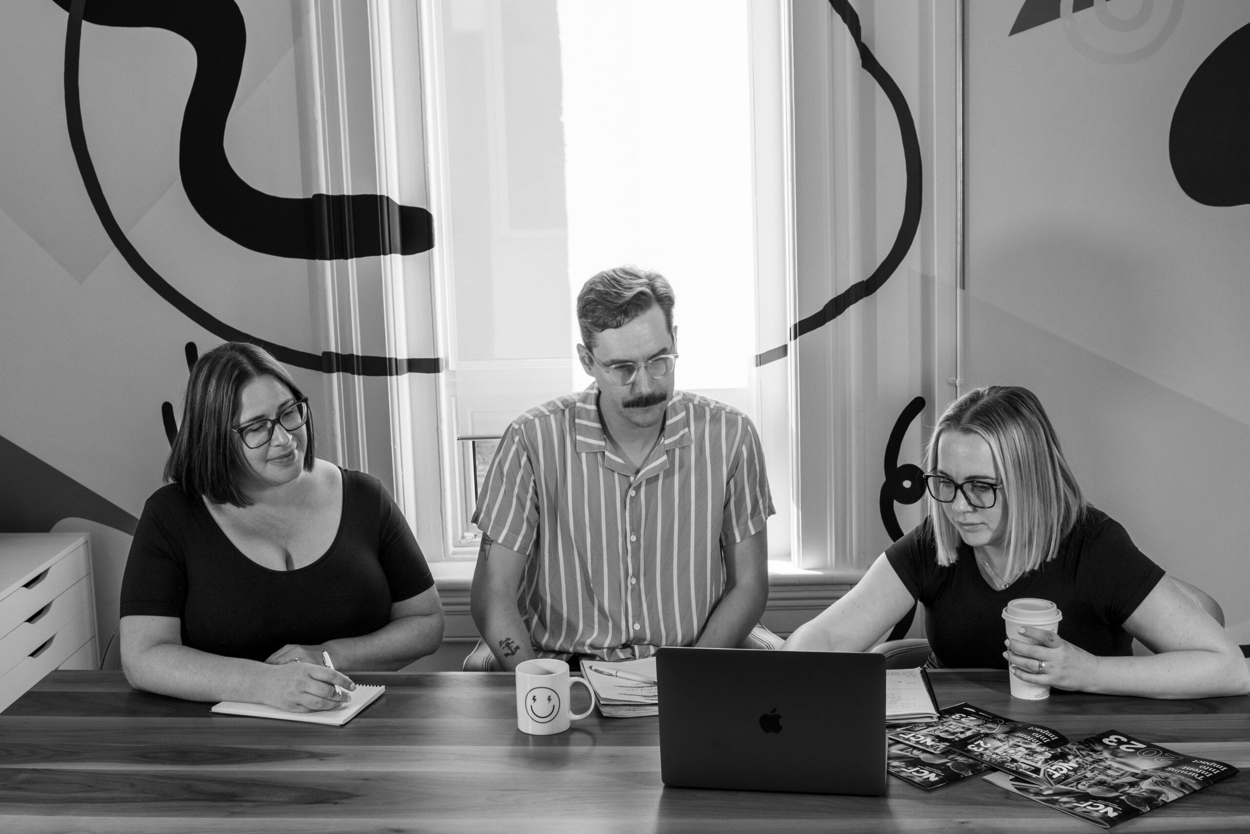 hughes&co leadership team in the main office board room